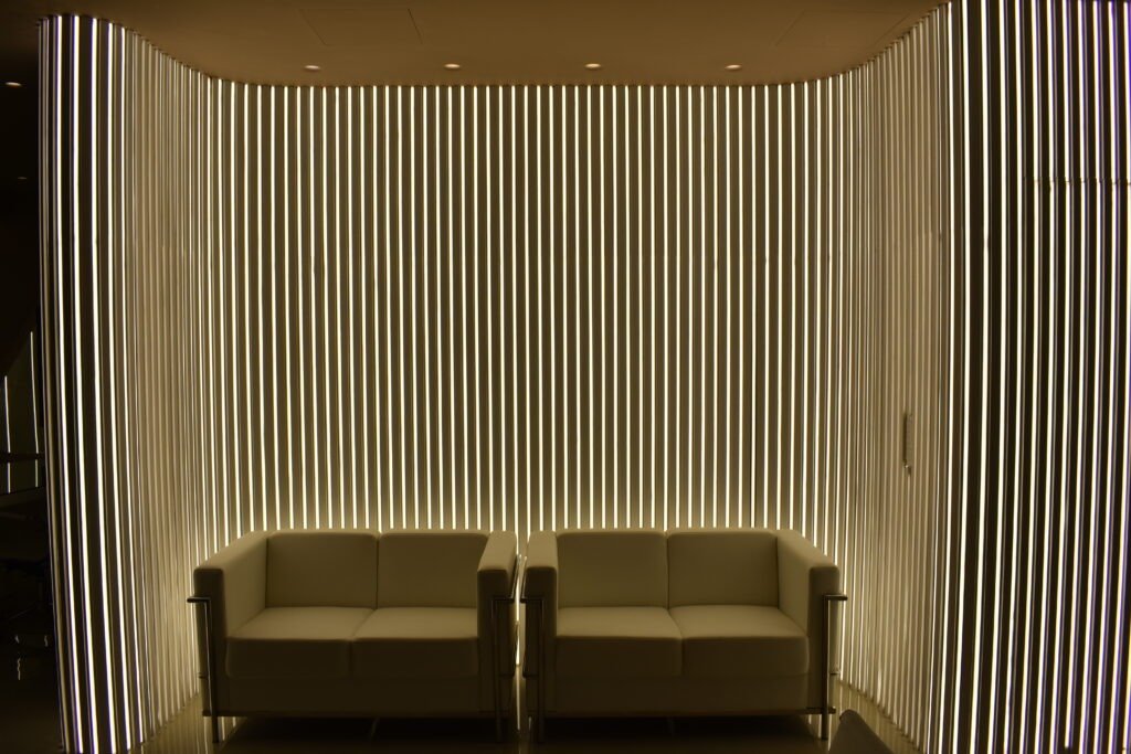 Modern lounge area with designer couch at Paterakis Luxury Homes office in Kolymvari